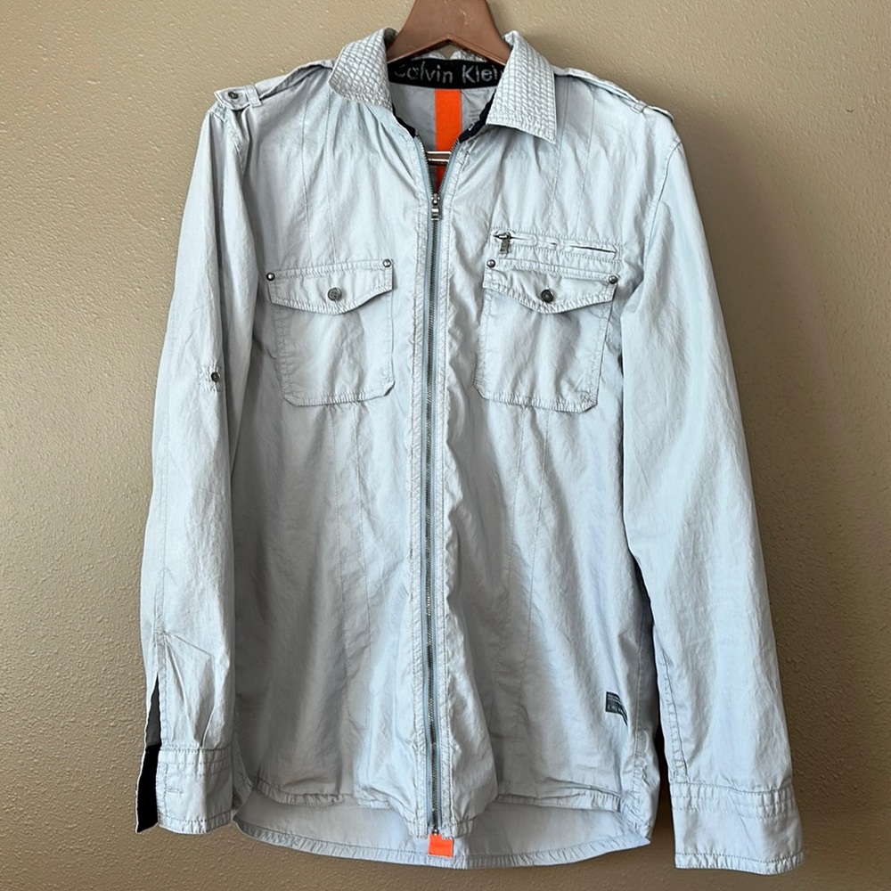 Women’s Calvin Klein zip up jacket; size med